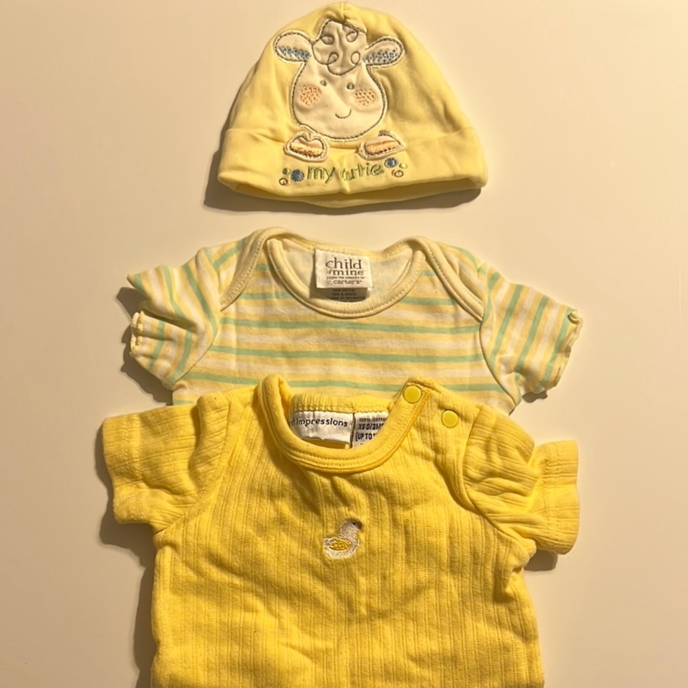 Gently worn Baby Onesie Set
